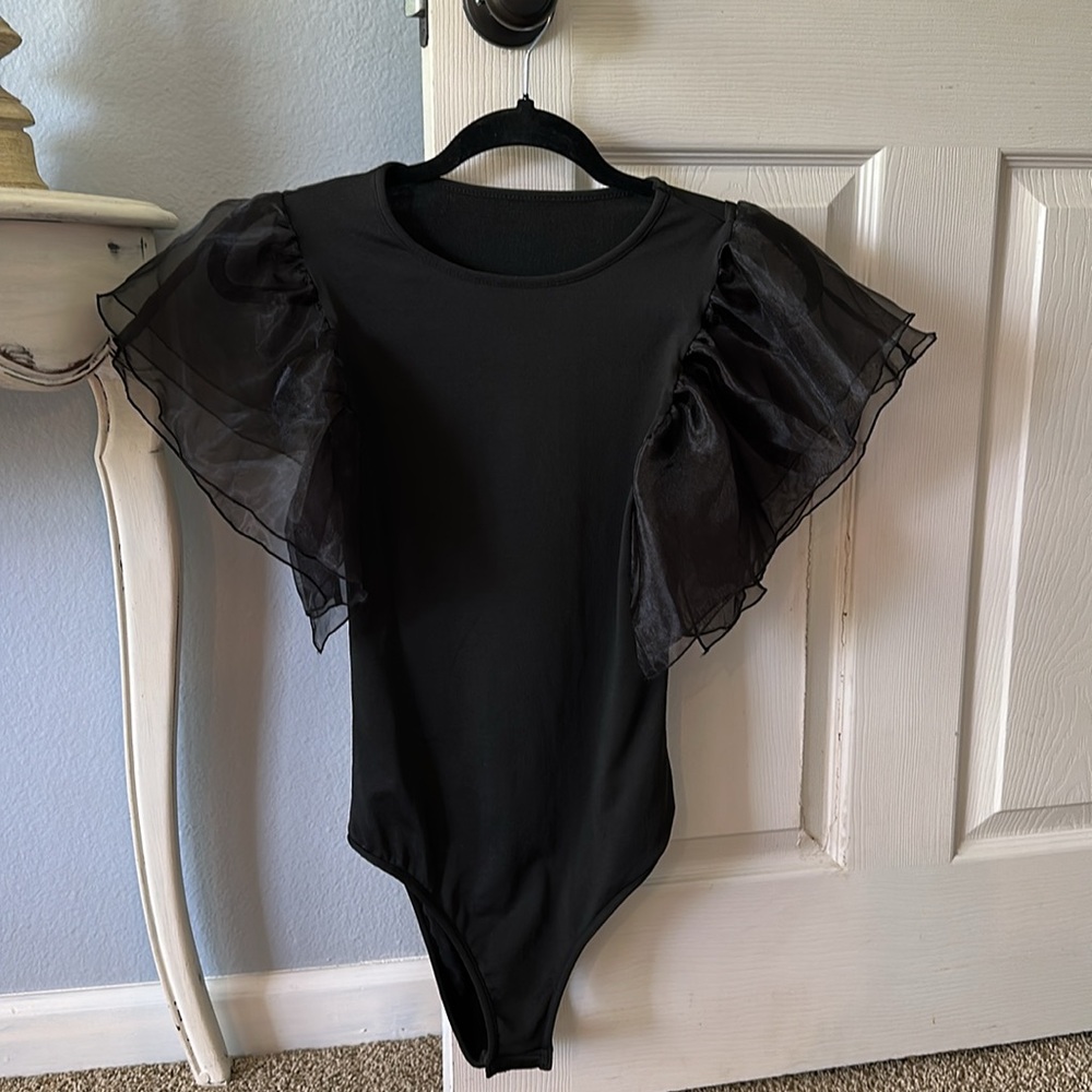 NWOT. Flutter Sleeve Black Bodysuit. Size Medium.